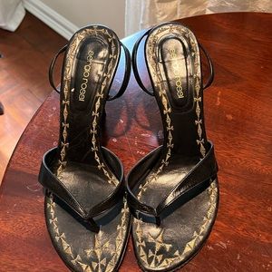 Preloved black sandals. Style thong. Good condition. Fits small and narrow.